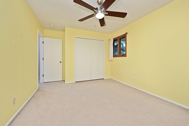 3760 Trenton Ln N, Plymouth, MN 55441 - unfurnished bedroom featuring carpet floors, a closet, and a ceiling fan