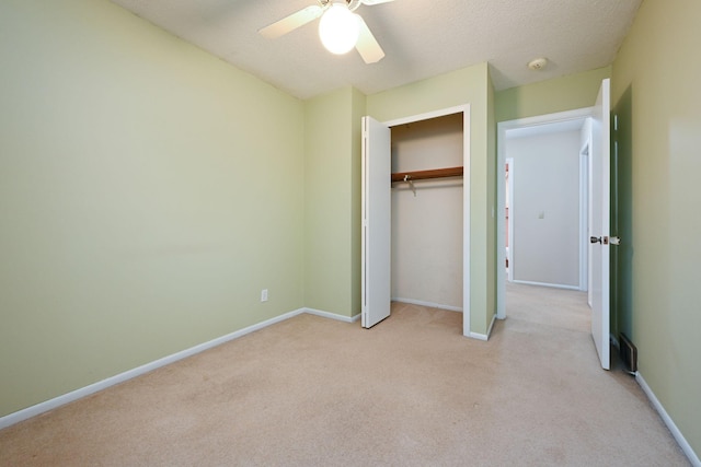 3760 Trenton Ln N, Plymouth, MN 55441 - unfurnished bedroom with light carpet, a closet, and a ceiling fan