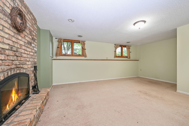 3760 Trenton Ln N, Plymouth, MN 55441 - unfurnished living room with a textured ceiling, carpet floors, plenty of natural light, and a fireplace