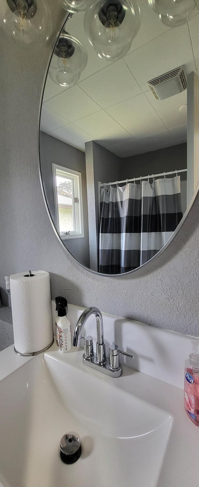 5252 Queen Ave N, Minneapolis, MN 55430 - bathroom view of curtained shower and vanity