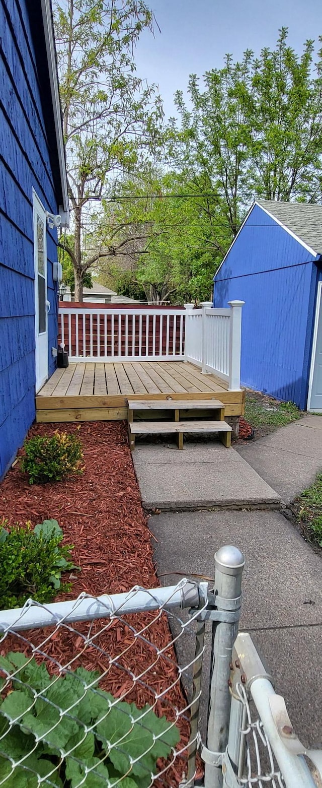 5252 Queen Ave N, Minneapolis, MN 55430 - view of yard featuring a deck and an outdoor structure