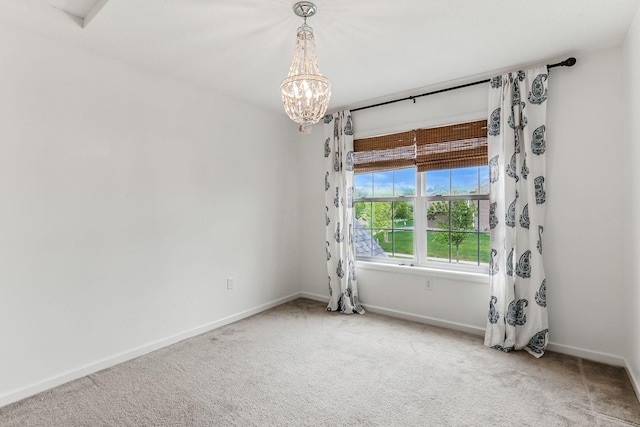 11632 Riverstone Trl, Woodbury, MN 55129 - empty room with carpet floors, a chandelier, and baseboards