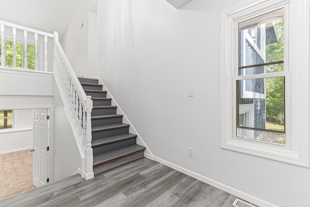 500 Ridge Ln, Chaska, MN 55318 - stairs featuring healthy amount of natural light, baseboards, and wood finished floors