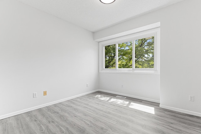 500 Ridge Ln, Chaska, MN 55318 - empty room featuring wood finished floors and baseboards