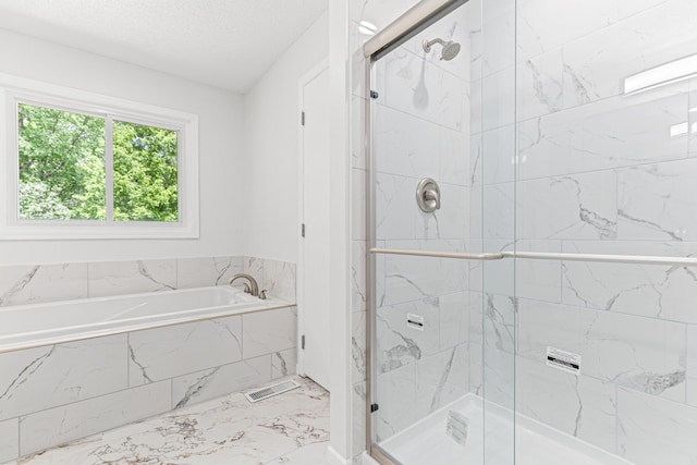 500 Ridge Ln, Chaska, MN 55318 - bathroom with a bath, a marble finish shower, and marble look tiles