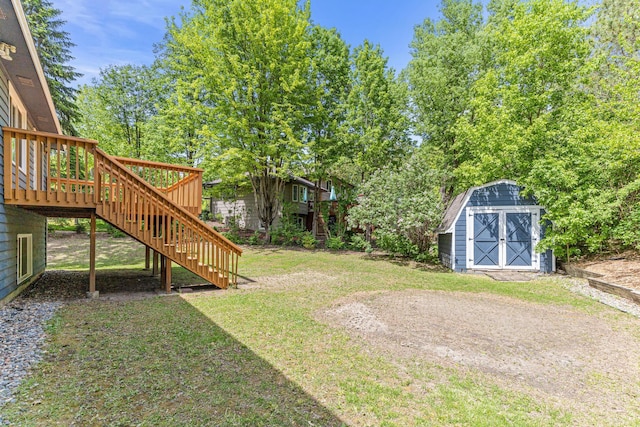 500 Ridge Ln, Chaska, MN 55318 - view of green lawn with stairs, a storage shed, a deck, and an outdoor structure