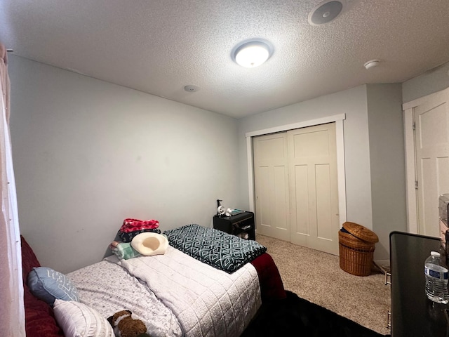 1784 Sandstone Curv, Shakopee, MN 55379 - bedroom with carpet flooring, a closet, and a textured ceiling