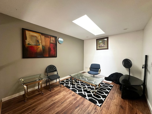 1784 Sandstone Curv, Shakopee, MN 55379 - living area with a skylight, wood finished floors, and baseboards