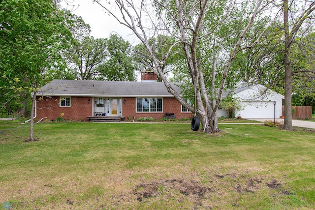 1513 40th Ave N, Moorhead, MN 56560 - ranch-style home with brick siding, a chimney, driveway, a front yard, and a garage