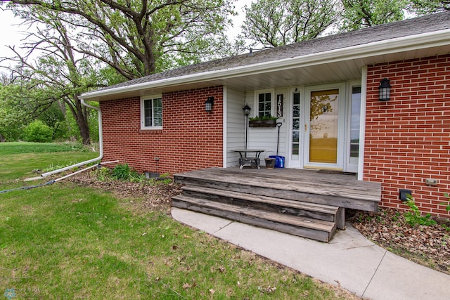 1513 40th Ave N, Moorhead, MN 56560 - property entrance with brick siding and a yard