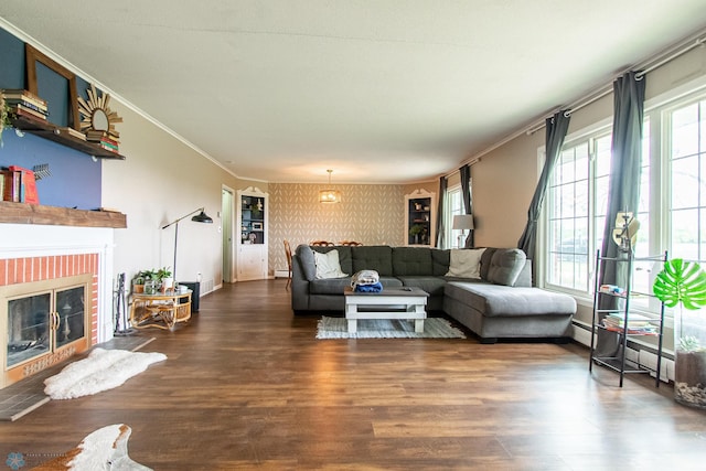 1513 40th Ave N, Moorhead, MN 56560 - living room featuring wallpapered walls, dark wood-style floors, a brick fireplace, ornamental molding, and baseboards