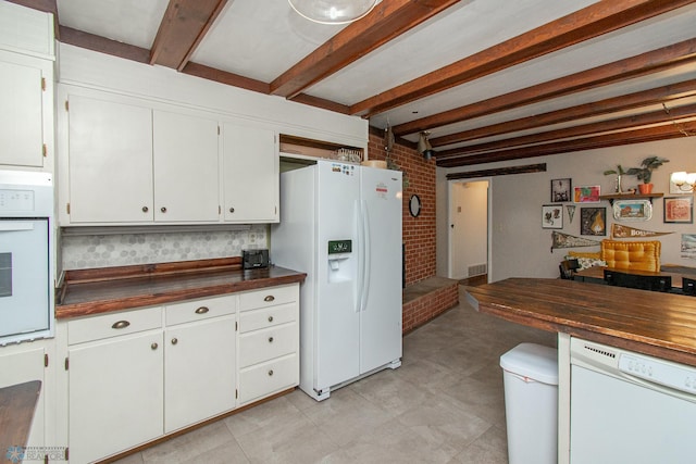 1513 40th Ave N, Moorhead, MN 56560 - kitchen with white appliances, butcher block countertops, beam ceiling, white cabinetry, and brick wall