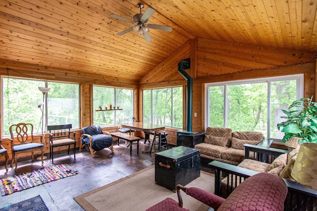 1513 40th Ave N, Moorhead, MN 56560 - living area featuring wooden walls, healthy amount of natural light, ceiling fan, hardwood / wood-style flooring, and high vaulted ceiling