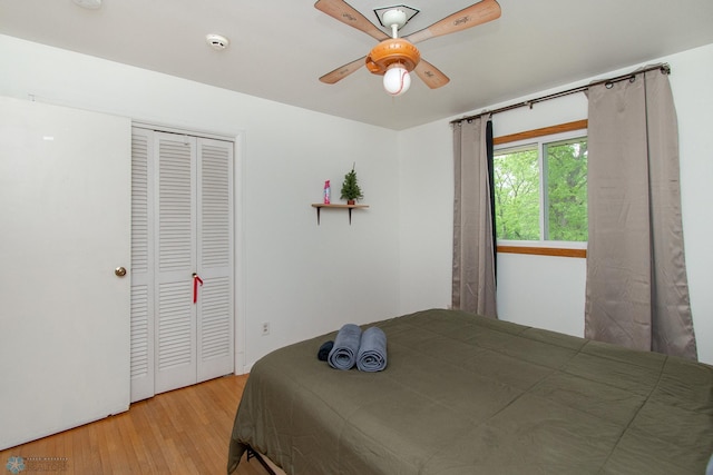 1513 40th Ave N, Moorhead, MN 56560 - bedroom featuring wood finished floors, a closet, and ceiling fan