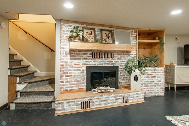 1513 40th Ave N, Moorhead, MN 56560 - unfurnished living room featuring recessed lighting, a brick fireplace, stairs, and baseboards