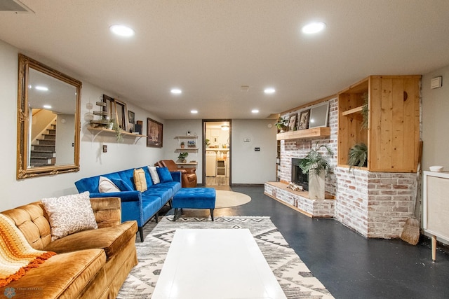 1513 40th Ave N, Moorhead, MN 56560 - living room with recessed lighting, stairway, a fireplace, and concrete flooring