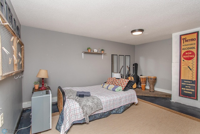 1513 40th Ave N, Moorhead, MN 56560 - bedroom with baseboards and a textured ceiling