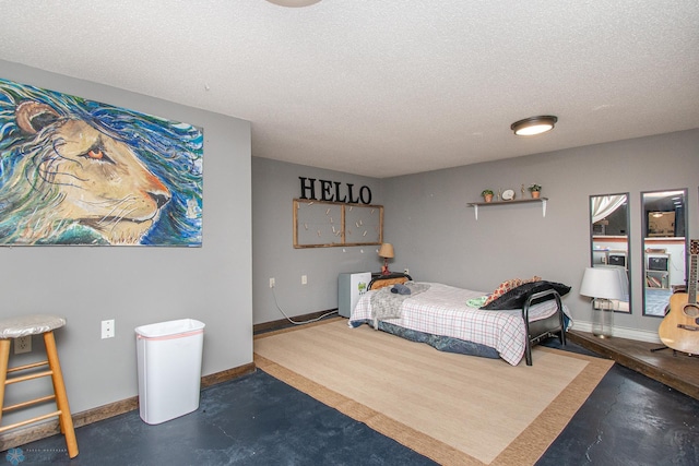 1513 40th Ave N, Moorhead, MN 56560 - bedroom with a textured ceiling, concrete floors, and baseboards