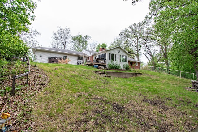 1513 40th Ave N, Moorhead, MN 56560 - view of yard featuring a deck and stairs