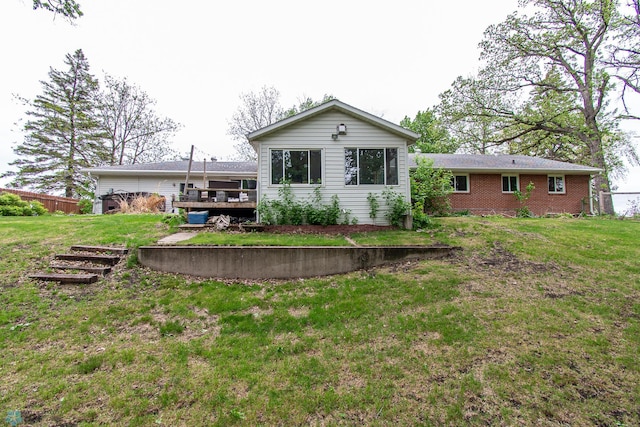 1513 40th Ave N, Moorhead, MN 56560 - rear view of property with a deck