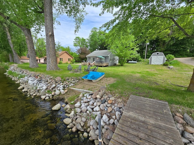 8137 Hoyt Ave SW, Victor Twp, MN 55349 - view of grassy yard featuring a deck