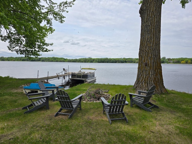 8137 Hoyt Ave SW, Victor Twp, MN 55349 - dock area with a water view and a lawn