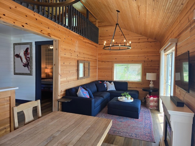 8137 Hoyt Ave SW, Victor Twp, MN 55349 - living area with wood walls, wood finished floors, lofted ceiling, a chandelier, and wood ceiling