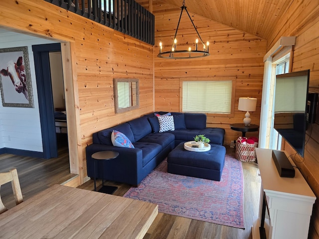 8137 Hoyt Ave SW, Victor Twp, MN 55349 - living room with wood finished floors, lofted ceiling, wood walls, a chandelier, and wood ceiling