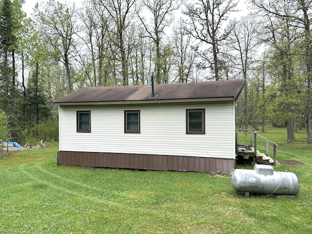 1529 Riddell Rd, Field Twp, MN 55723 - view of property exterior with a yard