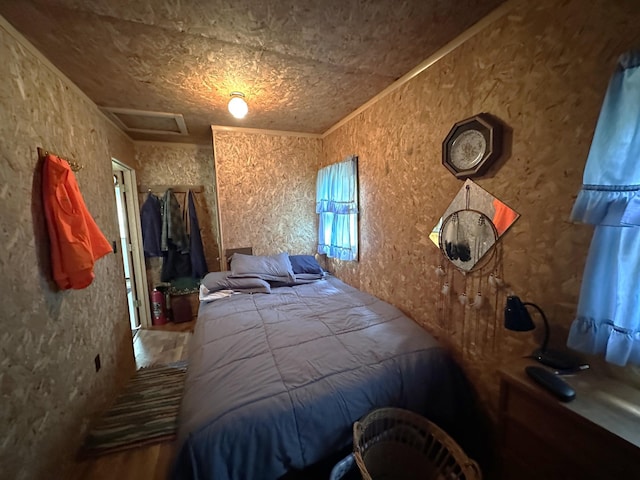 1529 Riddell Rd, Field Twp, MN 55723 - bedroom with attic access and wood finished floors