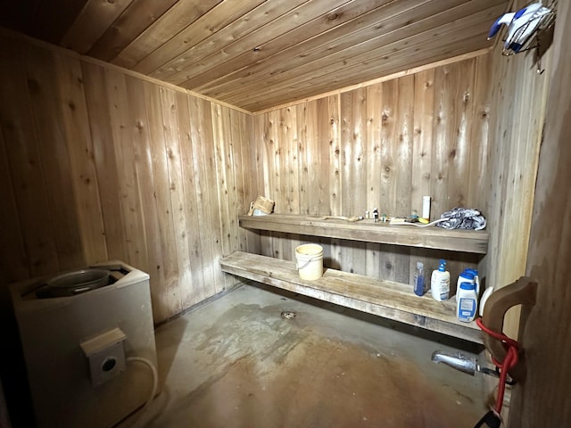 1529 Riddell Rd, Field Twp, MN 55723 - sauna featuring unfinished concrete flooring, wooden ceiling, and wooden walls