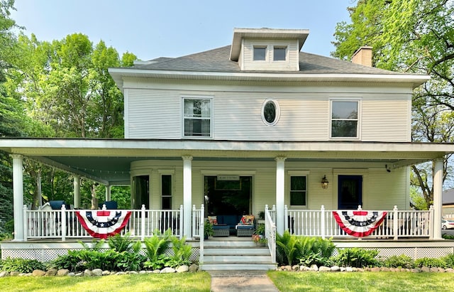 573 Rowland St, Tracy, MN 56175 - farmhouse featuring a porch and a chimney