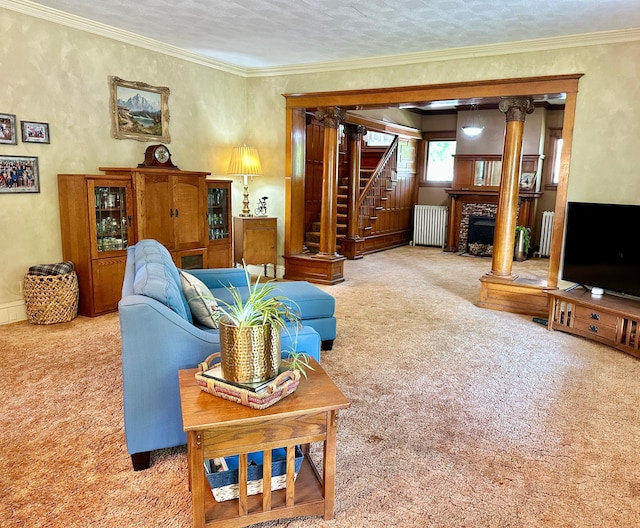 573 Rowland St, Tracy, MN 56175 - living room featuring carpet floors, radiator, a fireplace, stairway, and crown molding