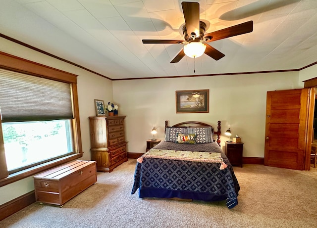 573 Rowland St, Tracy, MN 56175 - bedroom with light carpet, ornamental molding, baseboards, and ceiling fan