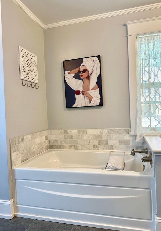 573 Rowland St, Tracy, MN 56175 - bathroom with a bath, ornamental molding, and tile patterned flooring