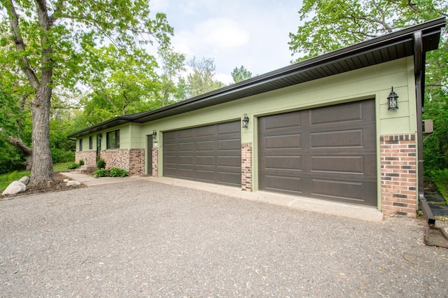 19715 Tyler St NW, Elk River, MN 55330 - garage with driveway