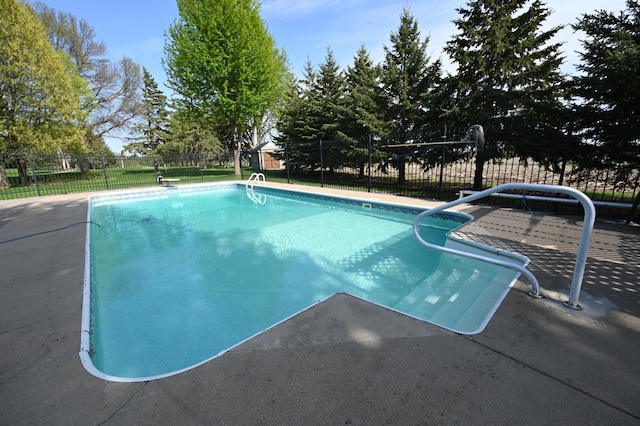 306 Windcrest Ln SE, New Prague, MN 56071 - view of swimming pool with fence