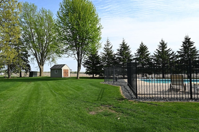 306 Windcrest Ln SE, New Prague, MN 56071 - view of yard with an outbuilding and a shed