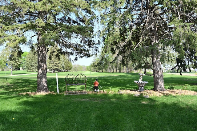 306 Windcrest Ln SE, New Prague, MN 56071 - view of community featuring a yard
