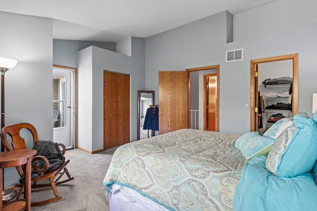 1925 Shenandoah Ct Unit F, Plymouth, MN 55447 - bedroom with a closet, light colored carpet, baseboards, and high vaulted ceiling