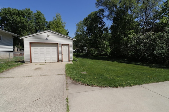 718 1st St SW, Faribault, MN 55021 - detached garage featuring driveway