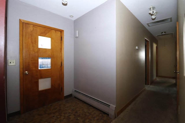 718 1st St SW, Faribault, MN 55021 - entryway featuring baseboard heating