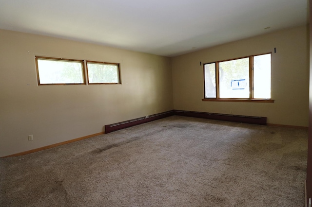 718 1st St SW, Faribault, MN 55021 - carpeted spare room featuring baseboards
