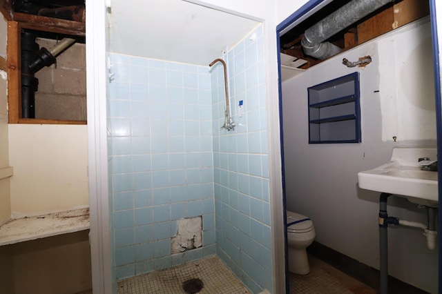 718 1st St SW, Faribault, MN 55021 - bathroom with a stall shower, toilet, and tile patterned floors