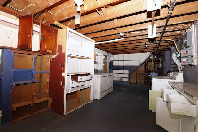 718 1st St SW, Faribault, MN 55021 - unfinished basement featuring washer and clothes dryer