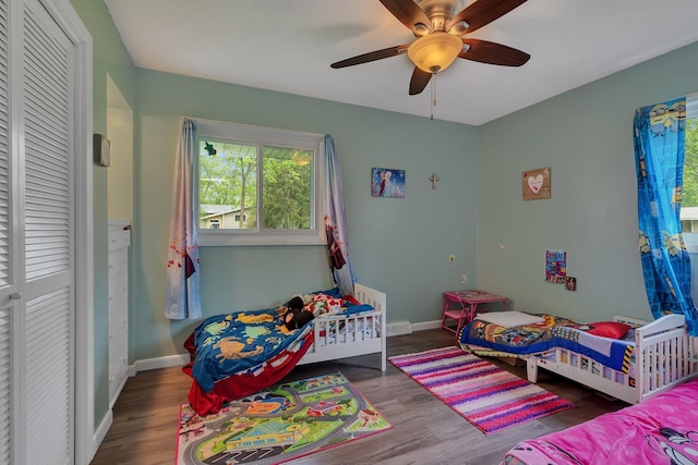 830 Halliday Rd, Saint Cloud, MN 56301 - bedroom featuring wood finished floors, baseboards, and ceiling fan