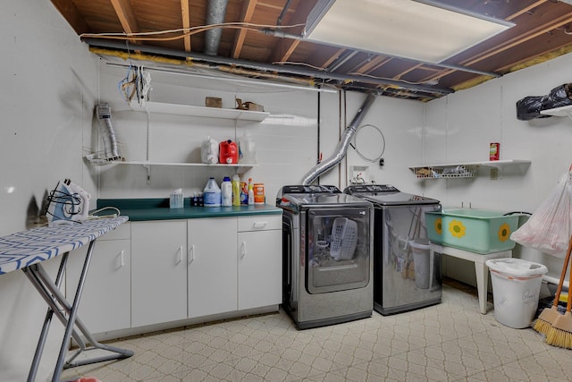 830 Halliday Rd, Saint Cloud, MN 56301 - laundry area with washer and dryer, cabinet space, and light floors