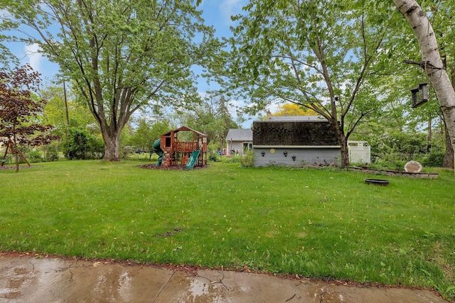 830 Halliday Rd, Saint Cloud, MN 56301 - view of grassy yard featuring a playground