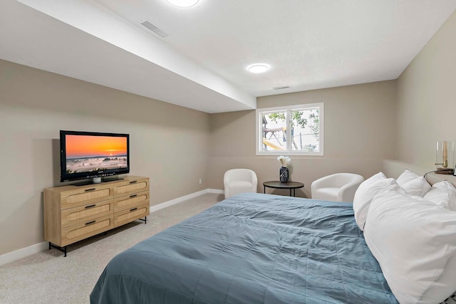 77 Emerson Ave W, West Saint Paul, MN 55118 - bedroom with light carpet and baseboards