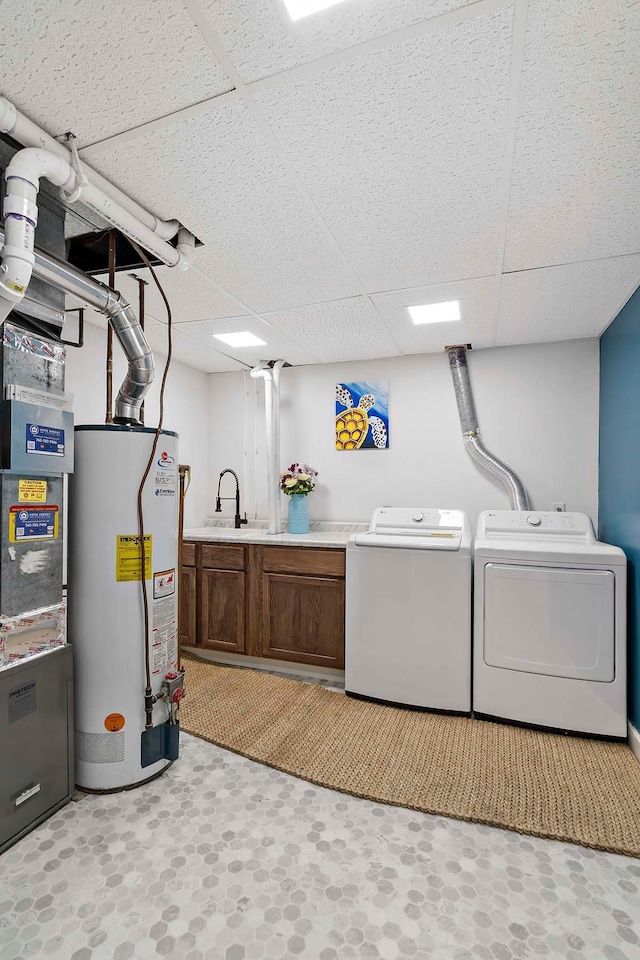 77 Emerson Ave W, West Saint Paul, MN 55118 - laundry room with water heater, cabinet space, and separate washer and dryer